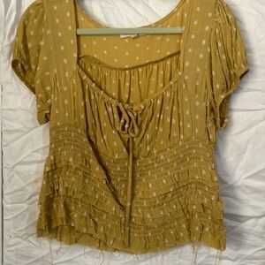 Mustard yellow ruffle bottom top